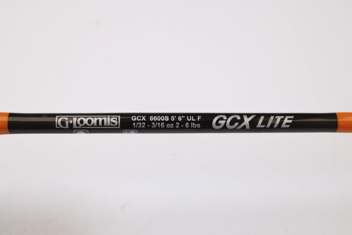 Close-up of a used G. Loomis GCX Lite 6600S 5'6" Ultra Light spinning rod in excellent condition—ideal for upgrading with our rod and reel trade-in or store credit for used gear.