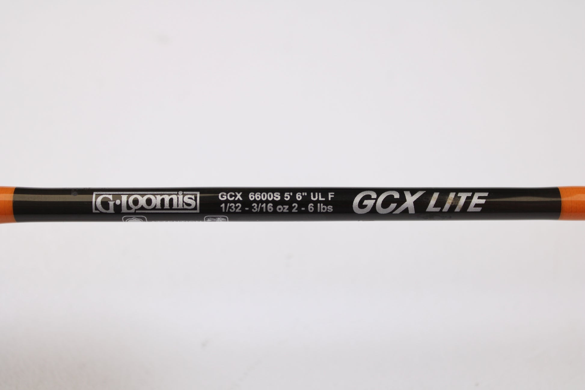 Close-up of a used G. Loomis GCX Lite 6600S 5'6" Ultra Light spinning rod in excellent condition—ideal for upgrading with our rod and reel trade-in or store credit for used gear.