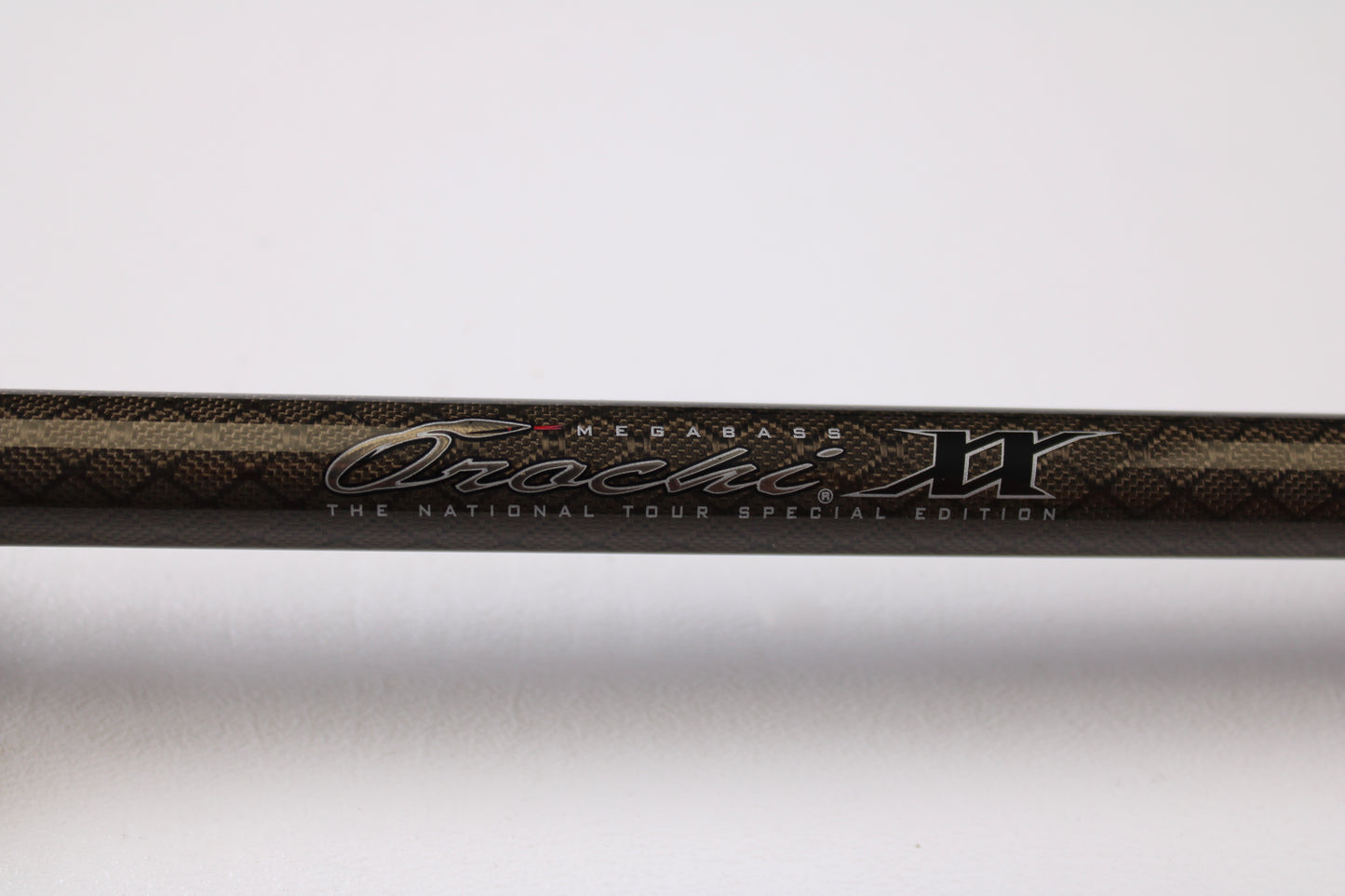 Close-up of a Megabass Orochi XX F6-711XXG Launcher 7'11" Used Casting Rod in excellent condition, ideal for anglers seeking quality pre-owned gear or looking to trade in rods and reels for store credit.