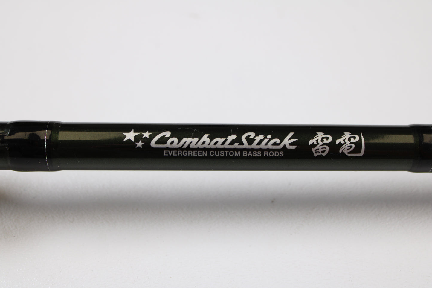 Close-up of an Evergreen International Combat Stick RCTC-70MHG 7'0" Medium Heavy Glass Used Casting Rod in excellent condition—ideal if you want to trade in your gear for store credit through our rod and reel trade-in program.