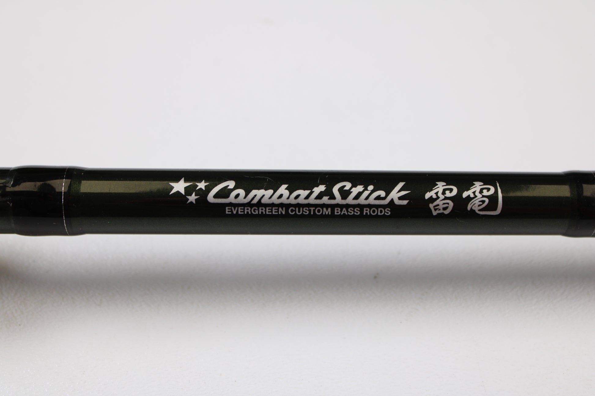 Close-up of an Evergreen International Combat Stick RCTC-70MHG 7'0" Medium Heavy Glass Used Casting Rod in excellent condition—ideal if you want to trade in your gear for store credit through our rod and reel trade-in program.
