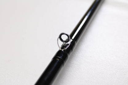 Close-up of an Evergreen International Combat Stick RCTC-70MHG 7'0" Medium Heavy Glass Used Casting Rod in excellent condition—great for those seeking used gear or aiming to boost store credit with our rod and reel trade-in program.