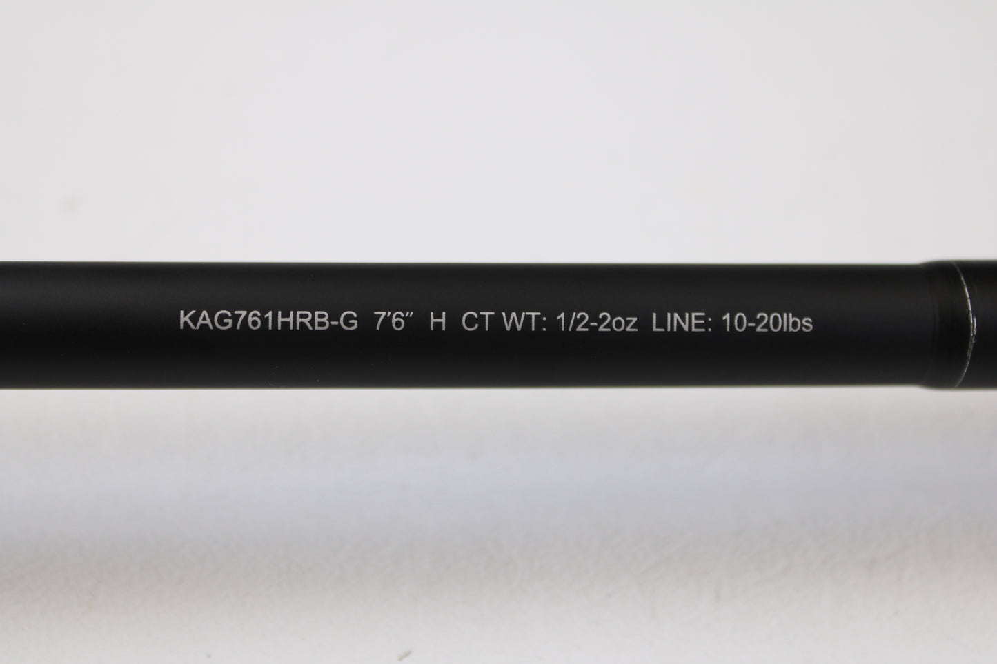 Close-up of a Daiwa Kage KAG761HRB-G Deep Crank 7'6" Heavy used casting rod in excellent condition, with white specs: "CT WT: 1/2-2oz LINE: 10-20lbs." Upgrade today with our rod and reel trade-in or store credit offers.
