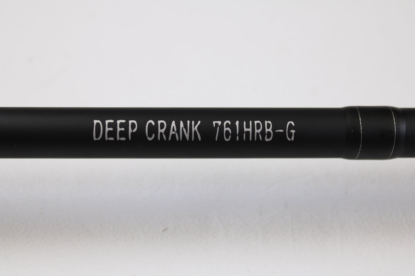 A close-up of a Daiwa Kage KAG761HRB-G Deep Crank 7'6" Heavy used casting rod in excellent condition, ideal for anglers looking to upgrade through our rod and reel trade-in program for store credit.