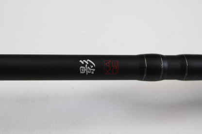 A close-up of the Daiwa Kage KAG761HRB-G Deep Crank 7'6" Heavy casting rod in excellent used condition, featuring white Japanese characters and a red "KAGE" logo—ideal for those seeking quality pre-owned rods or trading in gear.