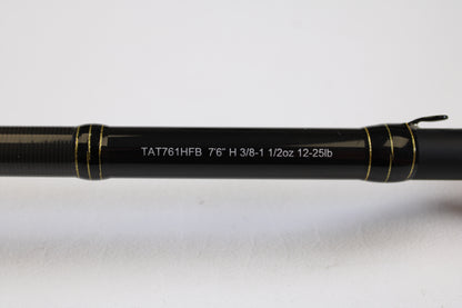 Close-up of the Daiwa Tatula TAT761HFB 7'6" Heavy - Used Casting Rod in excellent condition, showing specs on the shaft—eligible for our Rod and Reel Trade-In Program and used gear store credit.