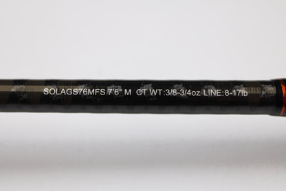 Close-up of a Daiwa Sol AGS SOLAGS76MFS 7'6" Medium Used Spinning Rod in excellent condition, showing specs printed in white on the black rod—eligible for our Rod and Reel Trade-In Program for store credit.