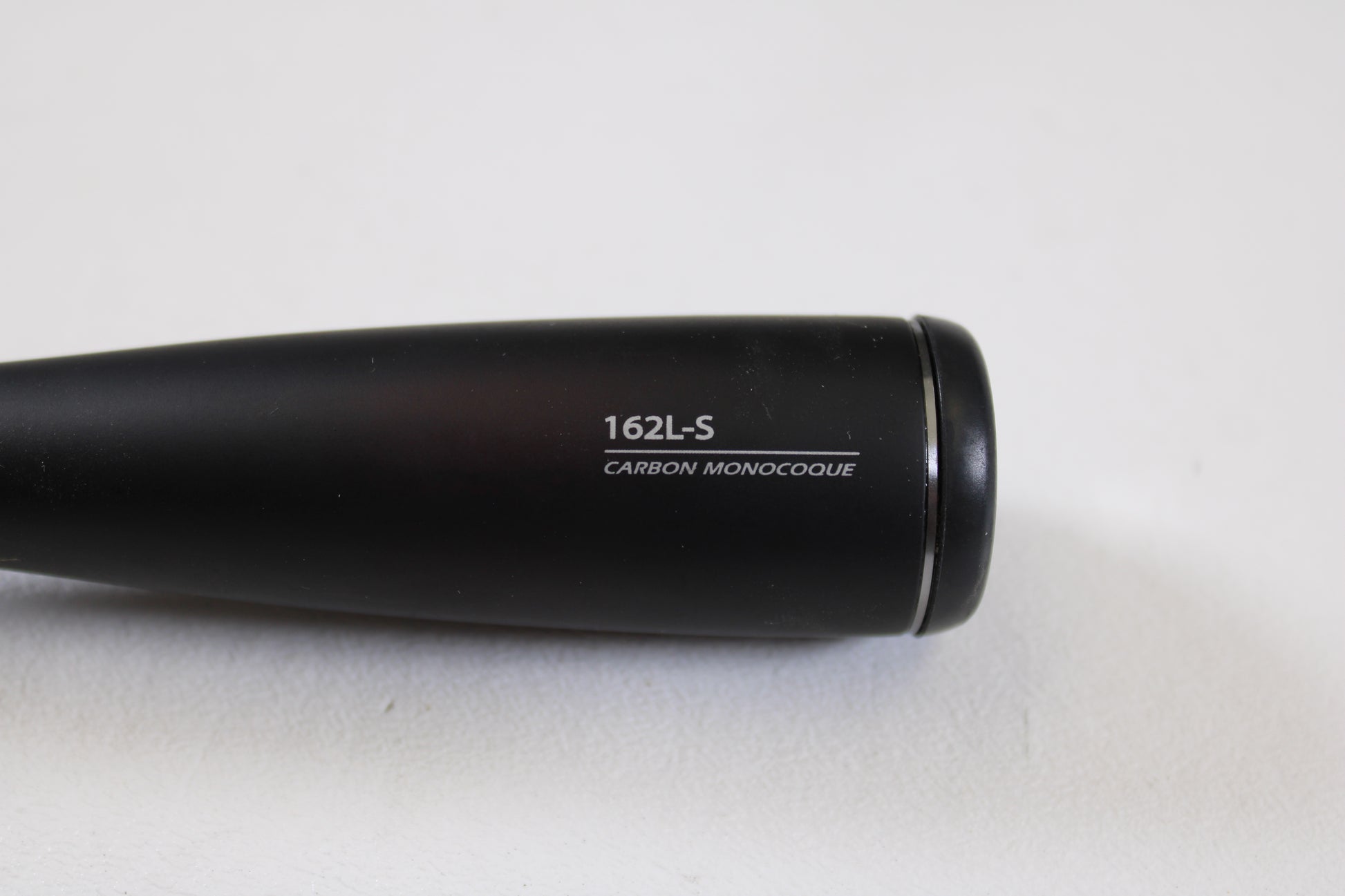 A close-up of the Shimano Poison Ultima 162L-S 6'2" Light Used Casting Rod in very good condition on a plain white background, ideal for those interested in our Rod and Reel Trade-In Program or store credit for used gear.