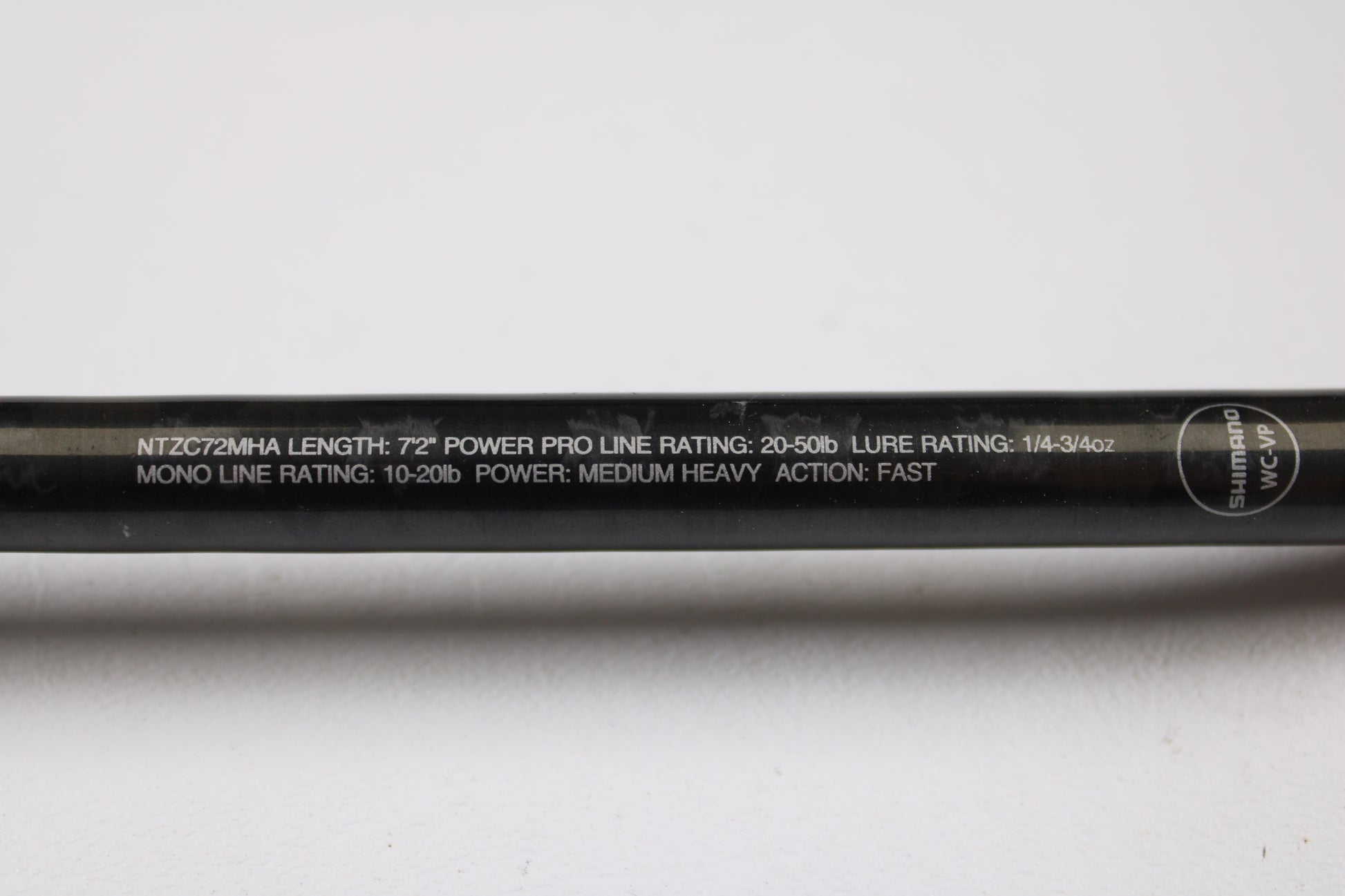 A close-up of the Shimano Intenza A NTZC72MHA 7'2" Medium Heavy casting rod in good used condition, showing specs and logo—perfect for anglers seeking trade-in or store credit on pre-owned gear.