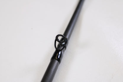 Close-up of the Shimano Intenza A NTZC72MHA 7'2" Medium Heavy Used Casting Rod’s guide, highlighting the black metal ring—ideal for anglers seeking quality used gear or trading in rods and reels for store credit.
