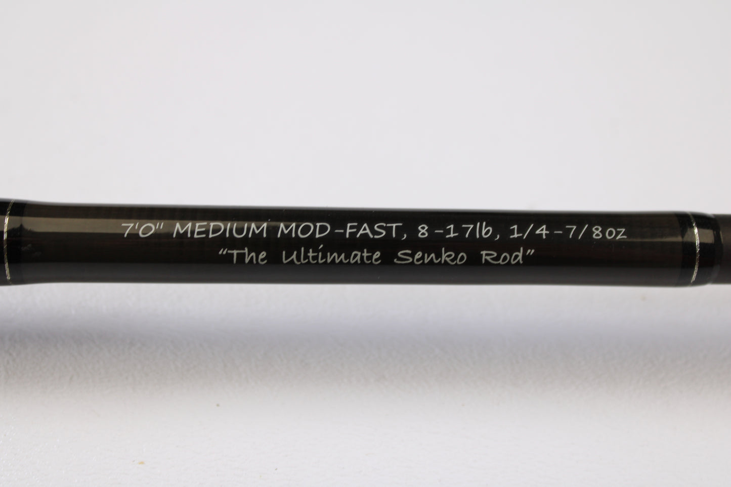 A close-up of the Spiralite Maverick SMC70MMF 7'0" Medium Used Casting Rod in excellent condition with crisp white lettering. Trade in your used gear for store credit through our Rod and Reel Trade-In Program.