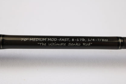 A close-up of the Spiralite Maverick SMC70MMF 7'0" Medium Used Casting Rod in excellent condition with crisp white lettering. Trade in your used gear for store credit through our Rod and Reel Trade-In Program.