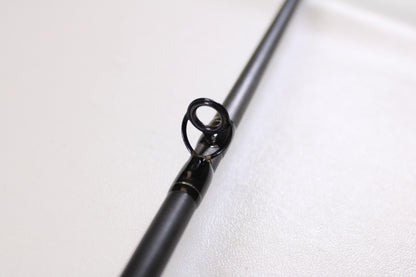 Close-up of the Spiralite Maverick SMC70MMF 7'0" Medium Used Casting Rod in excellent condition, highlighting the metal guide—ideal for those considering our Rod and Reel Trade-In Program or shopping quality used gear.
