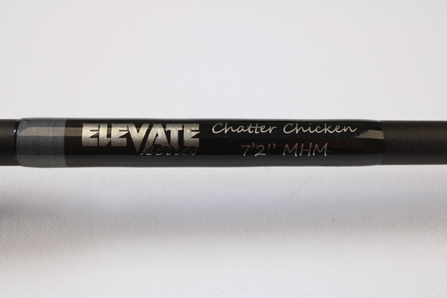 Close-up of the Stik5 Elevate Series Chatter Chicken 7'2" Medium Heavy Used Casting Rod in excellent condition, silver text on black, shown against a white background. Available now through our Rod and Reel Trade-In Program.