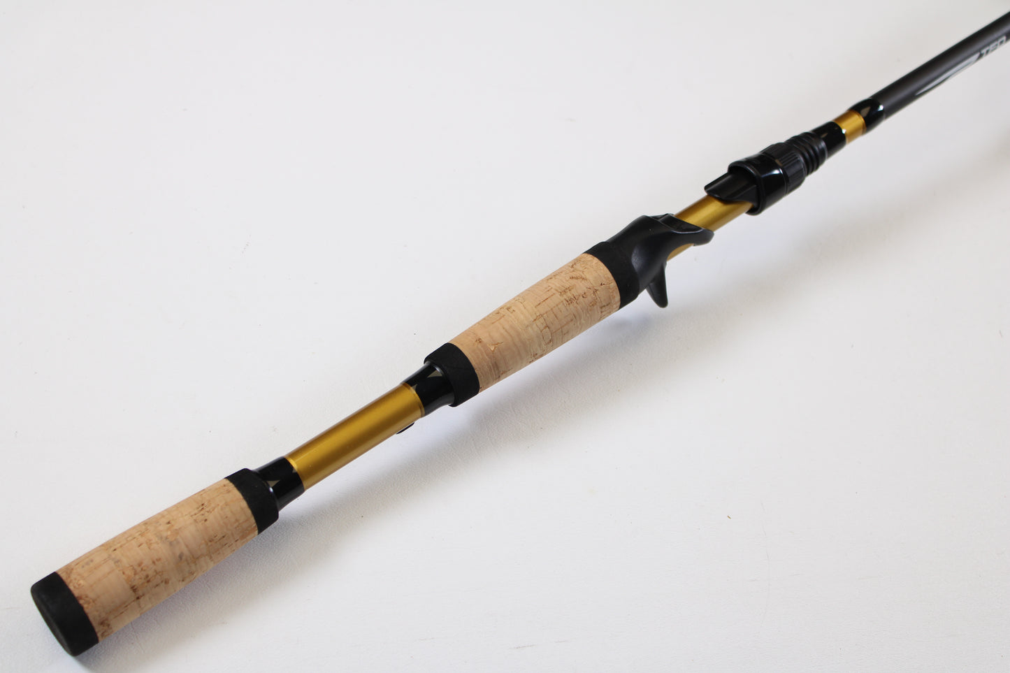 A close-up of the Temple Fork TFO Tactical Bass TACMBR734-1 7'3" Medium Used Casting Rod in excellent condition—ideal for upgrading your gear with our rod and reel trade-in program for store credit on used items.