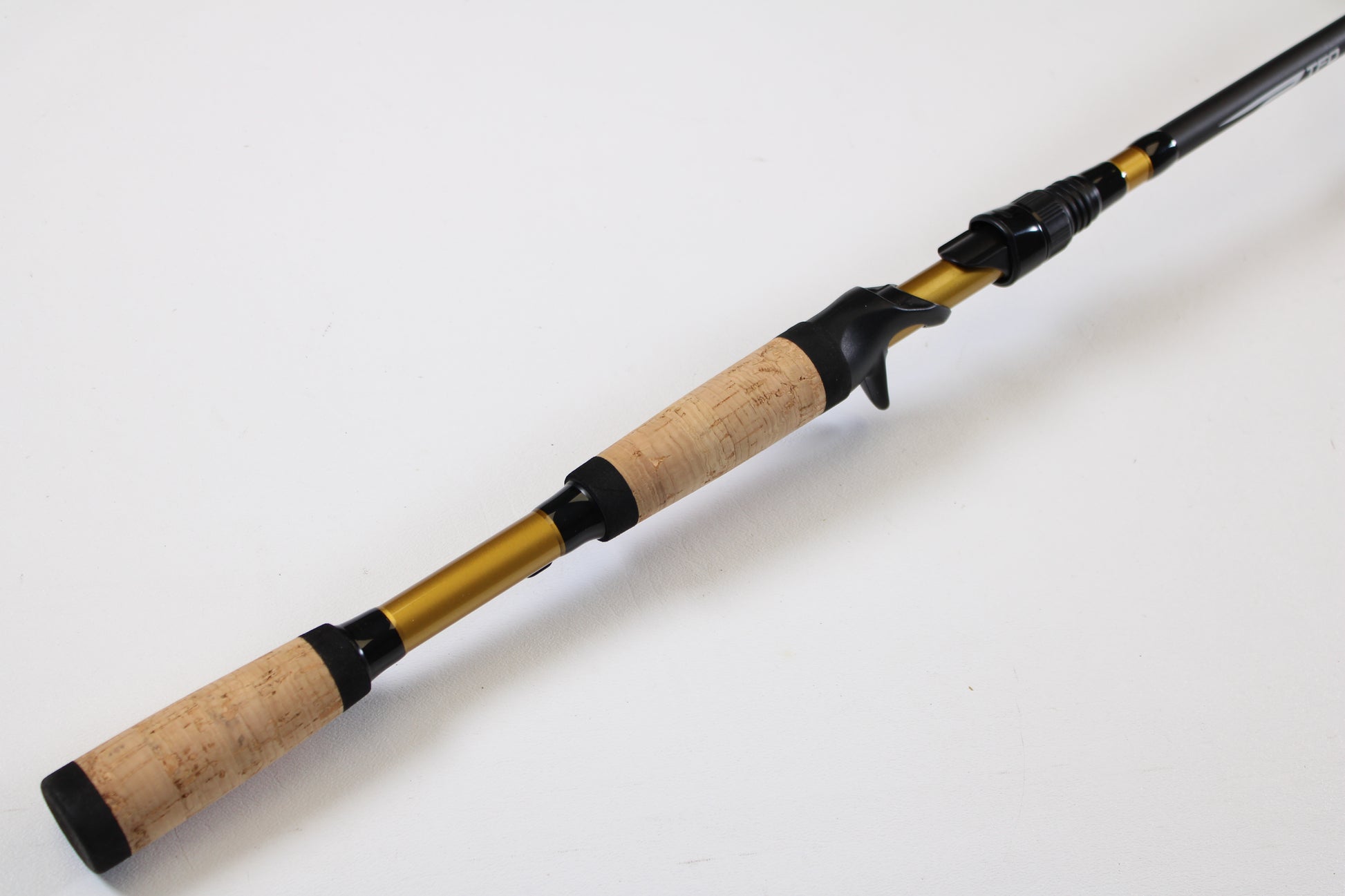 A close-up of the Temple Fork TFO Tactical Bass TACMBR734-1 7'3" Medium Used Casting Rod in excellent condition—ideal for upgrading your gear with our rod and reel trade-in program for store credit on used items.