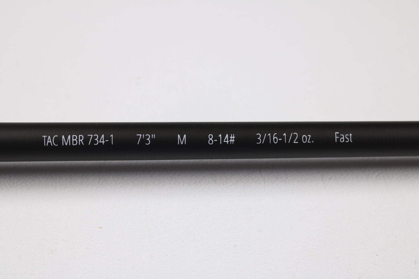 A close-up of the Temple Fork TFO Tactical Bass TACMBR734-1 7'3" Medium Used Casting Rod in excellent condition. Perfect for our rod and reel trade-in—swap your used gear for store credit. Shown on a plain white background.