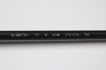 A close-up of the Temple Fork TFO Tactical Bass TACMBR734-1 7'3" Medium Used Casting Rod in excellent condition. Perfect for our rod and reel trade-in—swap your used gear for store credit. Shown on a plain white background.