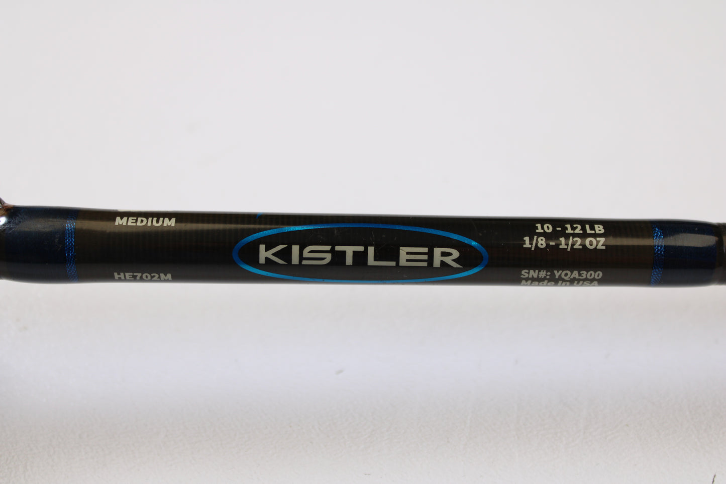 Close-up of a Kistler Helium HE702M 7'0" Medium Used Casting Rod—Very Good Condition—showing "Kistler" branding and rod specs, perfect for the Rod and Reel Trade-In or grabbing quality used gear.