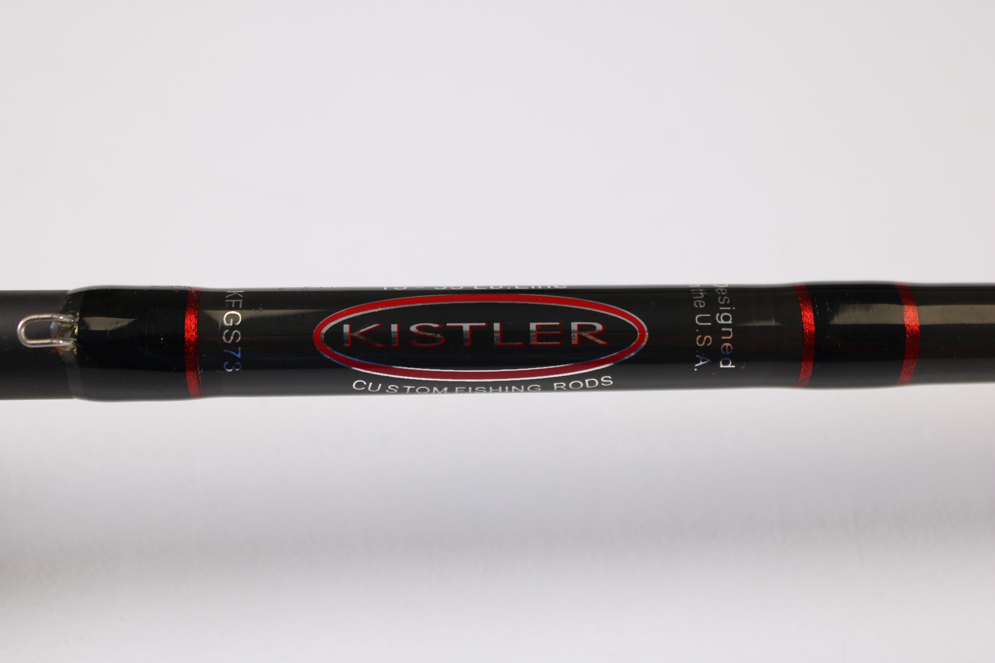 Close-up of a black Kistler KFGS73 Frog and Slop Special 7'3" Heavy used casting rod in very good condition, featuring red accents and white branding—ideal for fans of pre-owned gear or our Rod and Reel Trade-In Program. Plain white background.