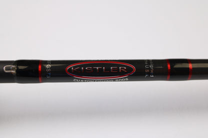 Close-up of a black Kistler KFGS73 Frog and Slop Special 7'3" Heavy used casting rod in very good condition, featuring red accents and white branding—ideal for fans of pre-owned gear or our Rod and Reel Trade-In Program. Plain white background.