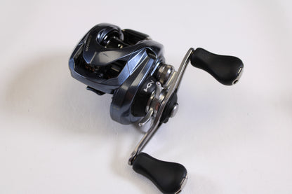 A close-up of the Shimano Aldebaran MGL ALDMGL51 6.5:1 LH Used Casting Reel in very good condition, perfect for upgrading with our Rod and Reel Trade-In Program—get store credit for your used Shimano gear.