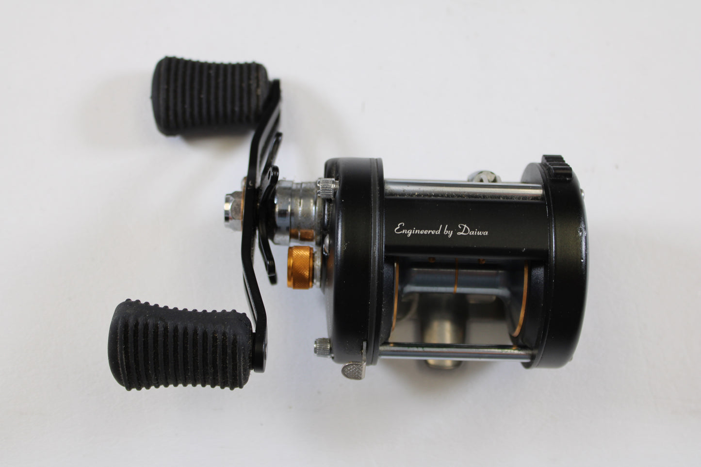 A Daiwa Millionaire Classic UTD M-CUTD250L 5.1:1 LH used casting reel in good condition is shown—ideal for anglers seeking quality Daiwa gear or exploring our Rod and Reel Trade-In Program.