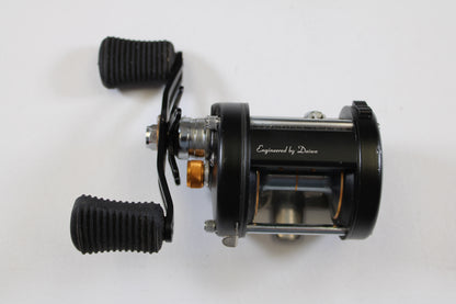 A Daiwa Millionaire Classic UTD M-CUTD250L 5.1:1 LH used casting reel in good condition is shown—ideal for anglers seeking quality Daiwa gear or exploring our Rod and Reel Trade-In Program.