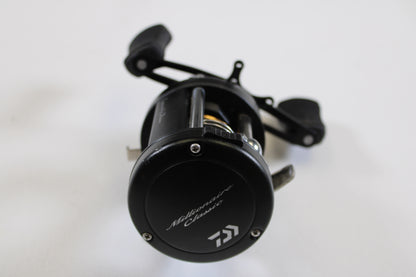 A used Daiwa Millionaire Classic UTD M-CUTD250L 5.1:1 LH casting reel in good condition is shown on a white background—ideal for upgrading through our Rod and Reel Trade-In Program or earning store credit for your used fishing gear.