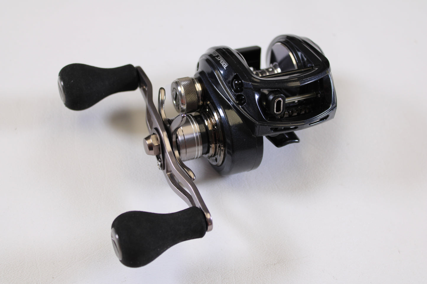 A close-up of Lew's BB1 Pro PRS1HZ 6.4:1 RH Used Casting Reel in excellent condition, with dual handles and sleek black design—ideal for upgrading through our Rod and Reel Trade-In Program for store credit.
