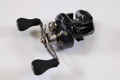 A close-up of Lew's BB1 Pro PRS1HZ 6.4:1 RH Used Casting Reel in excellent condition, with dual handles and sleek black design—ideal for upgrading through our Rod and Reel Trade-In Program for store credit.