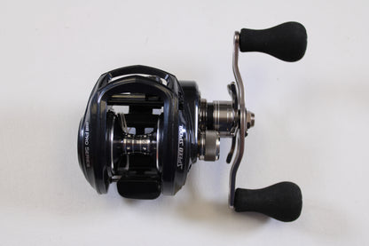 The Lew's BB1 Pro PRS1HZ 6.4:1 RH - Used Casting Reel, in excellent condition, features dual handles and a sleek black metallic finish—perfect for our Rod and Reel Trade-In Program or your used gear collection. Displayed on a white background.