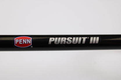 A close-up of the Penn Pursuit III PUTIII1530S70H 7'0" Heavy used spinning rod in excellent condition, featuring the Penn logo and "PURSUIT III" text on a black finish—ideal for upgrading through our rod and reel trade-in program.