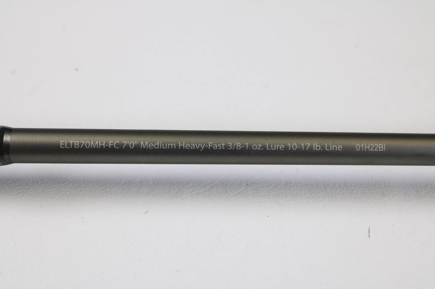 A close-up of a Fenwick Elite Bass ELTB70MH-FC 7'0" Medium Heavy Used Casting Rod in very good condition. Ask about our Rod and Reel Trade-In Program for store credit on your used gear!.