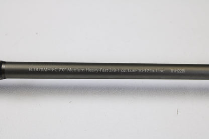 A close-up of a Fenwick Elite Bass ELTB70MH-FC 7'0" Medium Heavy Used Casting Rod in very good condition. Ask about our Rod and Reel Trade-In Program for store credit on your used gear!.