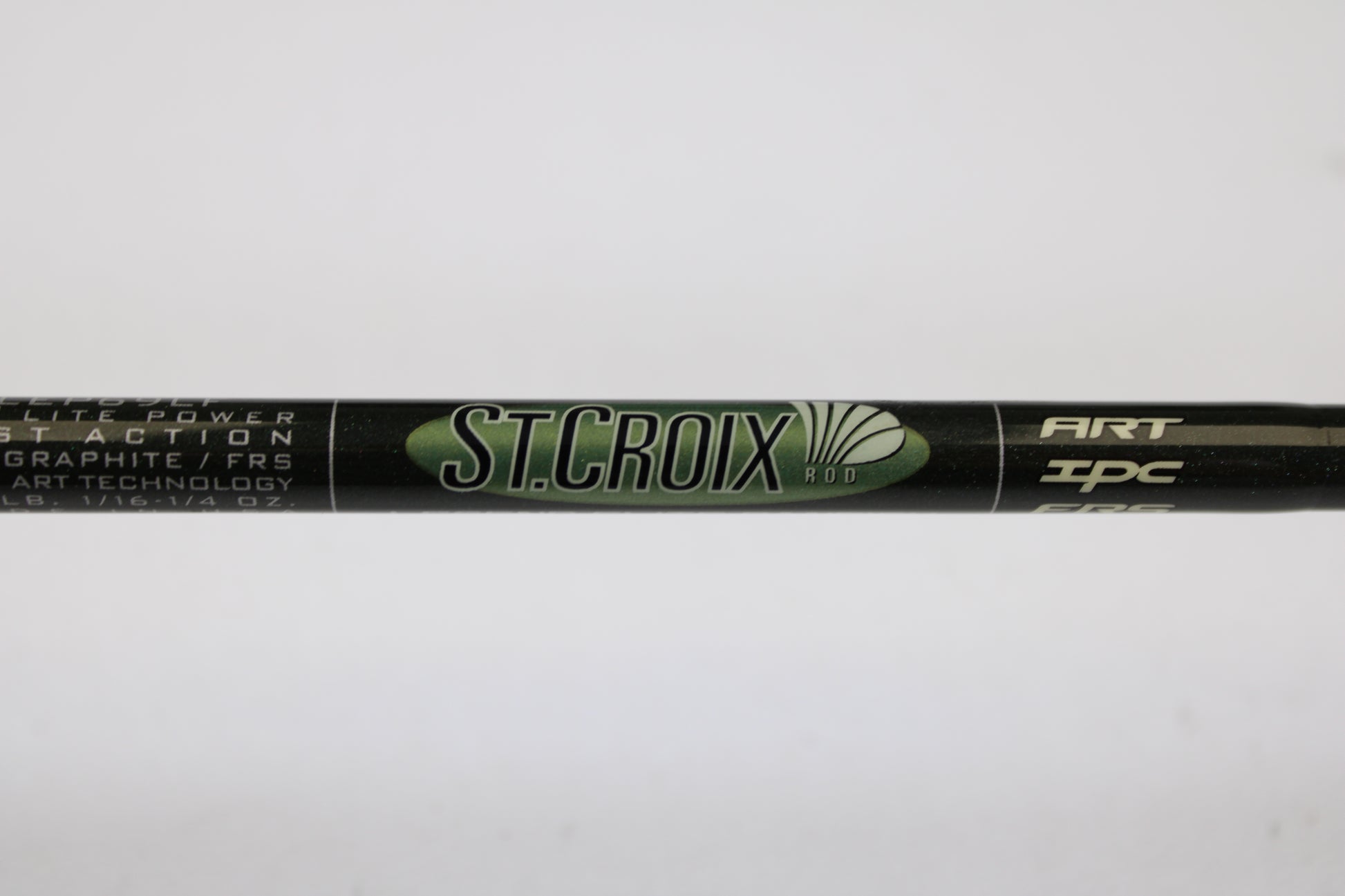 Close-up of a black St. Croix Legend Elite Panfish LEP69LF 6'9" Light used spinning rod in excellent condition, featuring "ST. CROIX ROD" in green and white plus product specs. Ask about our Rod and Reel Trade-In Program for store credit on used gear.