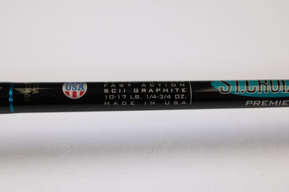 Close-up of a St. Croix Premier PC66MF 6'6" Medium Casting Rod in excellent condition, perfect for upgrading with our rod and reel trade-in for store credit. Text on the rod includes "USA," "FAST ACTION SCII GRAPHITE," and "MADE IN USA.