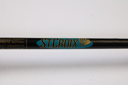 Close-up of a black St. Croix Premier Crankbait PC66MM 6'6" medium used casting rod in very good condition, featuring gold and blue "ST. CROIX ROD" text—ideal for our Rod and Reel Trade-In Program for store credit on used gear.