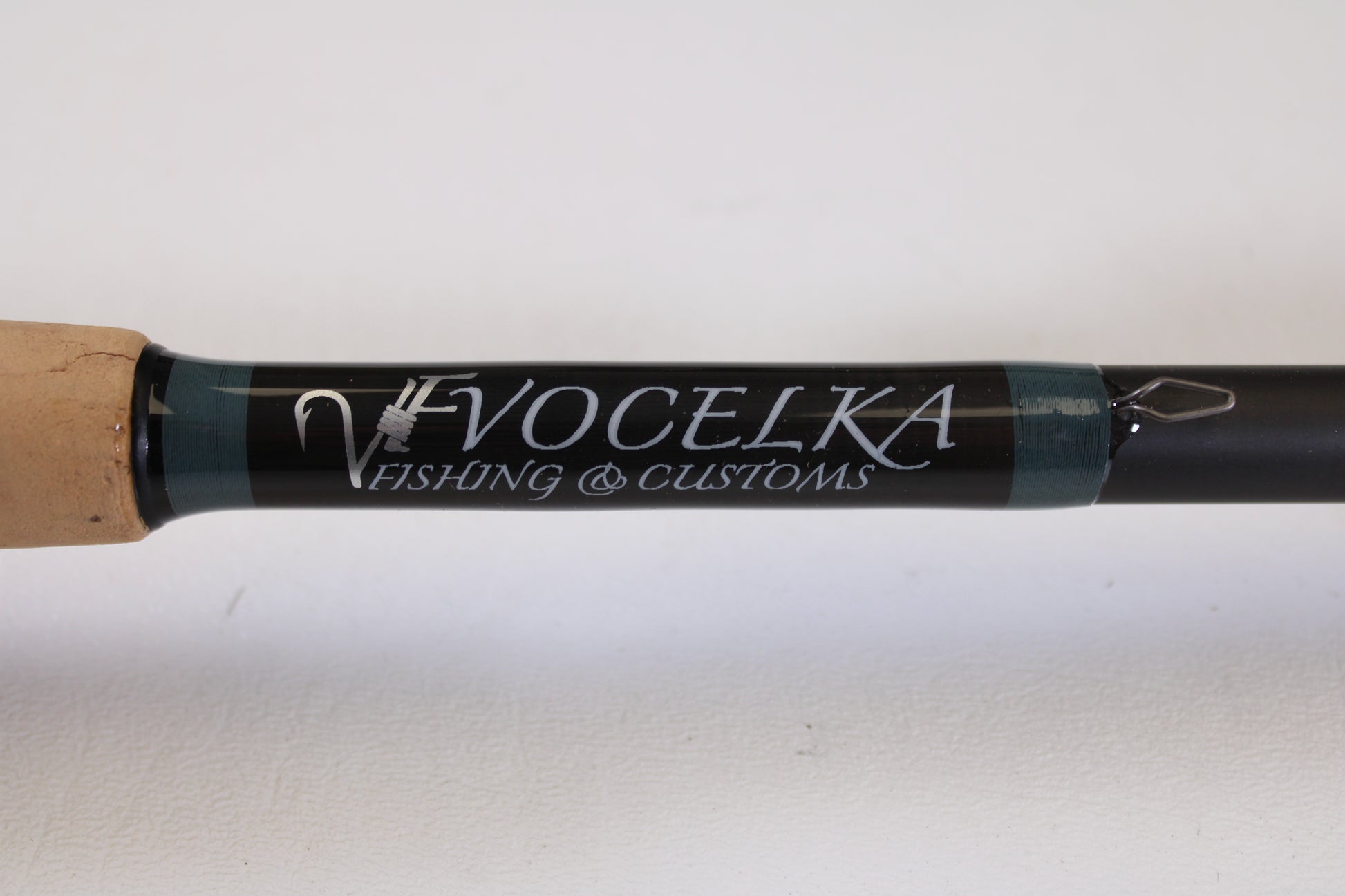 Close-up of a Vocelka Tournament Series The Spinnin' Rod 7'1" Medium Light (Used, Excellent Condition), featuring the Vocelka logo—a great option for those upgrading with our Rod and Reel Trade-In Program.