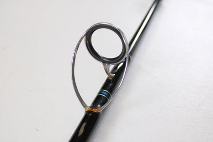 Close-up of a Cousins Tackle CLB 70XL-S 7'0" Extra Light used spinning rod’s line guide ring, metal supports, and blue thread—ideal for those trading gear in very good condition through our Rod and Reel Trade-In Program. Quantity: 2.