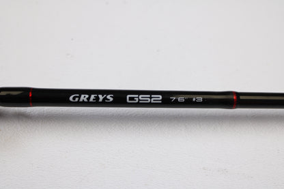 A close-up of a Greys GS2 7'6" 3wt 4 Piece Used Fly Rod in very good condition, with branding visible, set against a white background—ideal for those considering our Rod and Reel Trade-In Program for used gear or store credit.