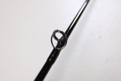 Close-up of the Greys GS2 7'6" 3wt 4 Piece Used Fly Rod (Very Good Condition), highlighting the black guide’s circular metal ring—ideal for anglers considering our Rod and Reel Trade-In Program to upgrade their gear.