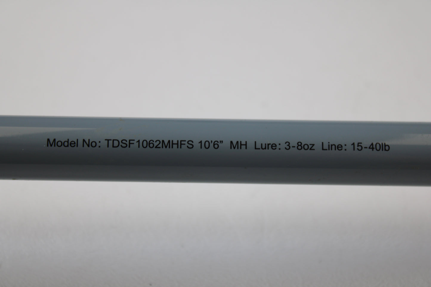 Close-up of a Daiwa Team Daiwa Surf TDSF1062MHFS 10'6" Medium Heavy 2-Piece Used Spinning Rod in Very Good Condition—ideal for those using our Rod and Reel Trade-In Program or looking for quality used Daiwa gear.