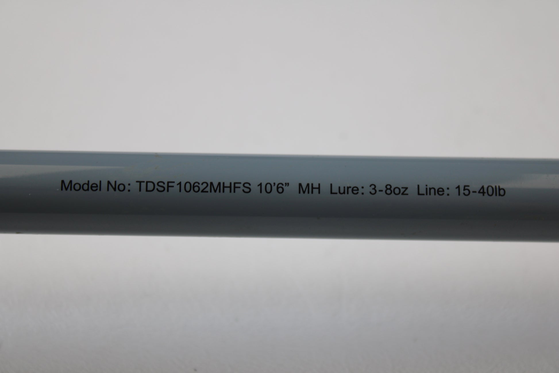 Close-up of a Daiwa Team Daiwa Surf TDSF1062MHFS 10'6" Medium Heavy 2-Piece Used Spinning Rod in Very Good Condition—ideal for those using our Rod and Reel Trade-In Program or looking for quality used Daiwa gear.
