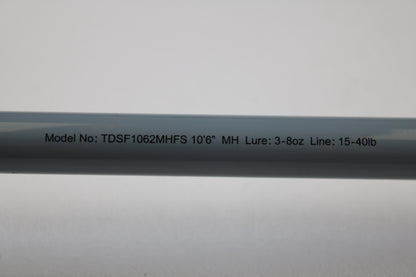 Close-up of a Daiwa Team Daiwa Surf TDSF1062MHFS 10'6" Medium Heavy 2-Piece Used Spinning Rod in Very Good Condition—ideal for those using our Rod and Reel Trade-In Program or looking for quality used Daiwa gear.