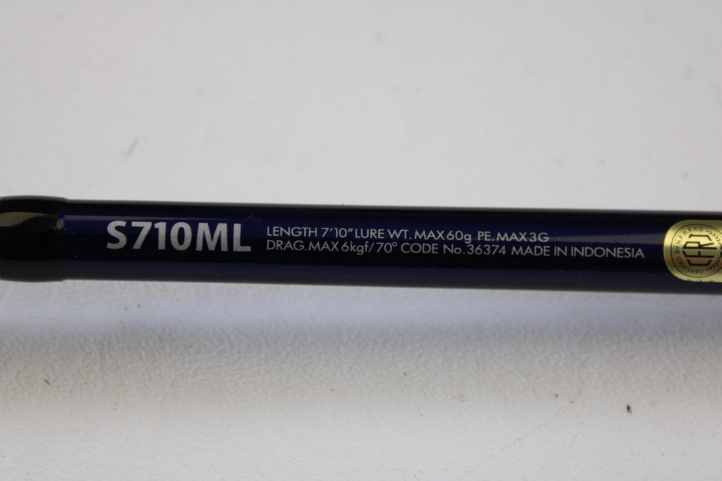 Close-up of a Shimano Ocea Plugger Flex Limited 7'10" Medium Light 2 Piece Used Spinning Rod in excellent condition—eligible for our Rod and Reel Trade-In Program and store credit on used gear.
