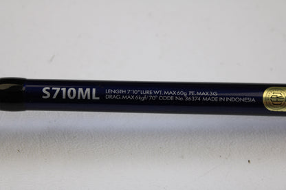 Close-up of a Shimano Ocea Plugger Flex Limited 7'10" Medium Light 2 Piece Used Spinning Rod in excellent condition—eligible for our Rod and Reel Trade-In Program and store credit on used gear.