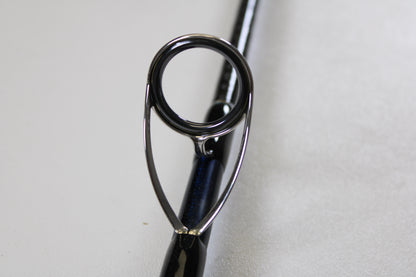 Close-up of the guide ring on the Shimano Ocea Plugger Flex Limited 7'10" Medium Light 2 Piece Used Spinning Rod in excellent condition—ideal for anyone exploring quality used Shimano gear.