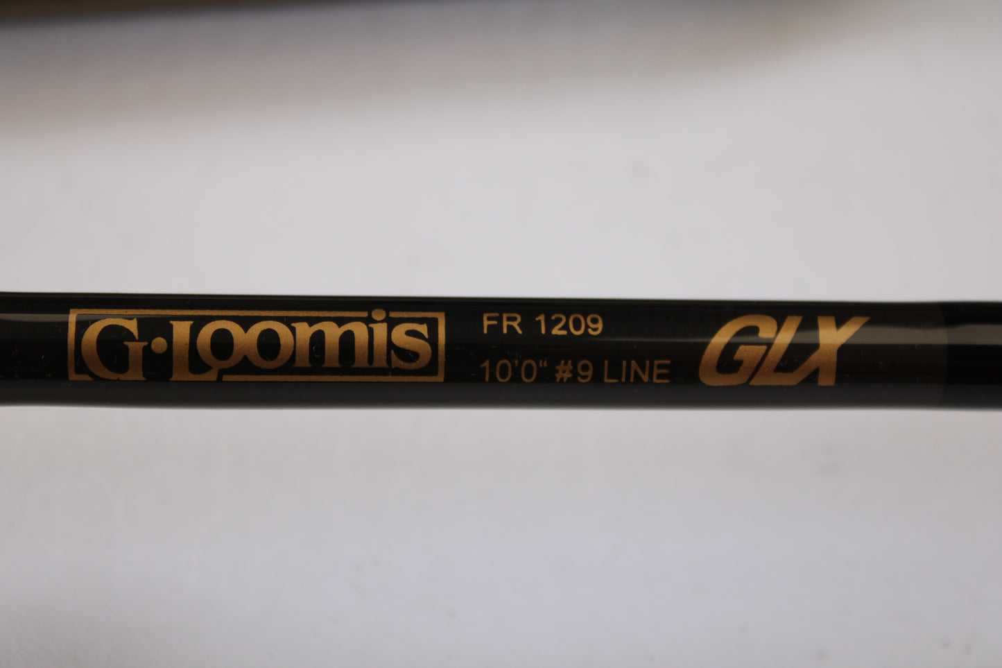 Close-up of a G. Loomis GLX FR1209 10'0" #9 2 Piece used fly rod in excellent condition—an ideal upgrade as part of our Rod and Reel Trade-In Program for store credit on used gear.