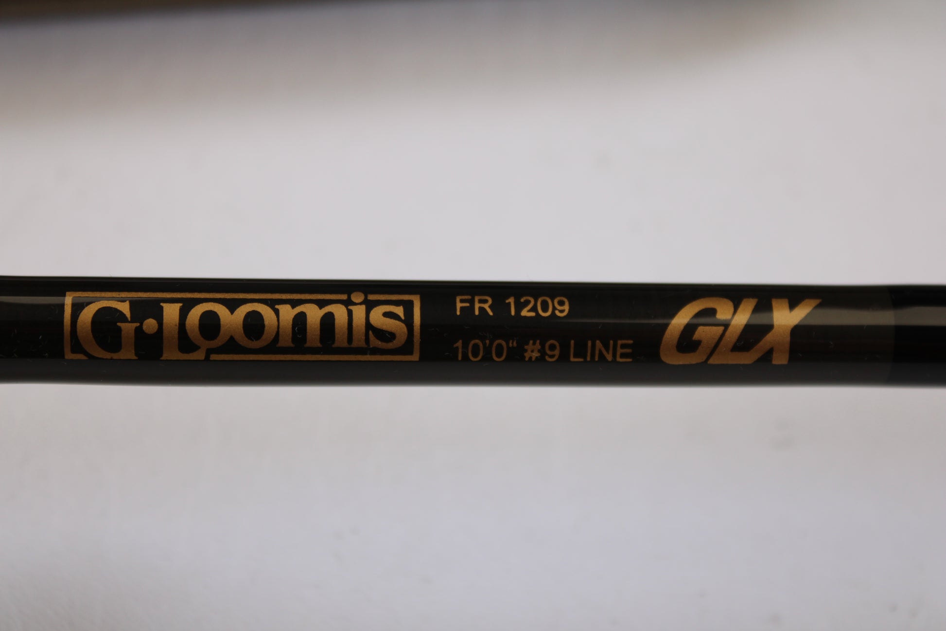 Close-up of a G. Loomis GLX FR1209 10'0" #9 2 Piece used fly rod in excellent condition—an ideal upgrade as part of our Rod and Reel Trade-In Program for store credit on used gear.
